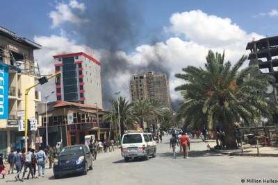 Smoke from a military airstrike rises above the streets of Mekele.