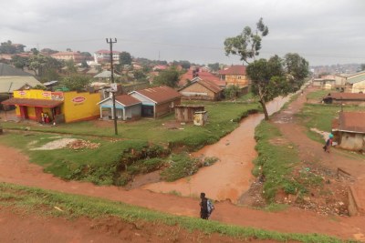 Homes and businesses cover an area formerly part of the Nsooba wetland in the Mulago area of Kampala, Uganda, Nov. 27, 2021.