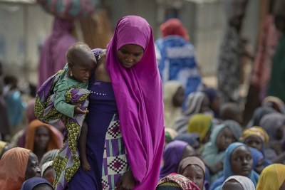 Internally displaced mothers and their children attend a World Food Programme famine assessment in Borno State, Nigeria (file photo).