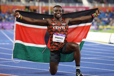 Ferdinand Omanyala celebrates after winning gold at the Commonwealth Games.