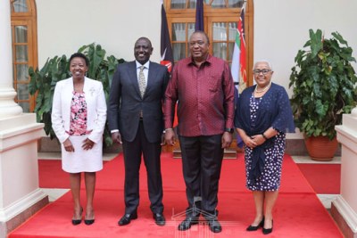 The outgoing President Uhuru Kenyatta (maroon shirt) hosts President William Ruto, his deputy for 10 years.