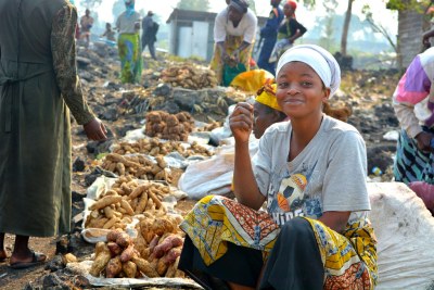 A woman sells food at a market in the Democratic Republic of the Congo (file photo).